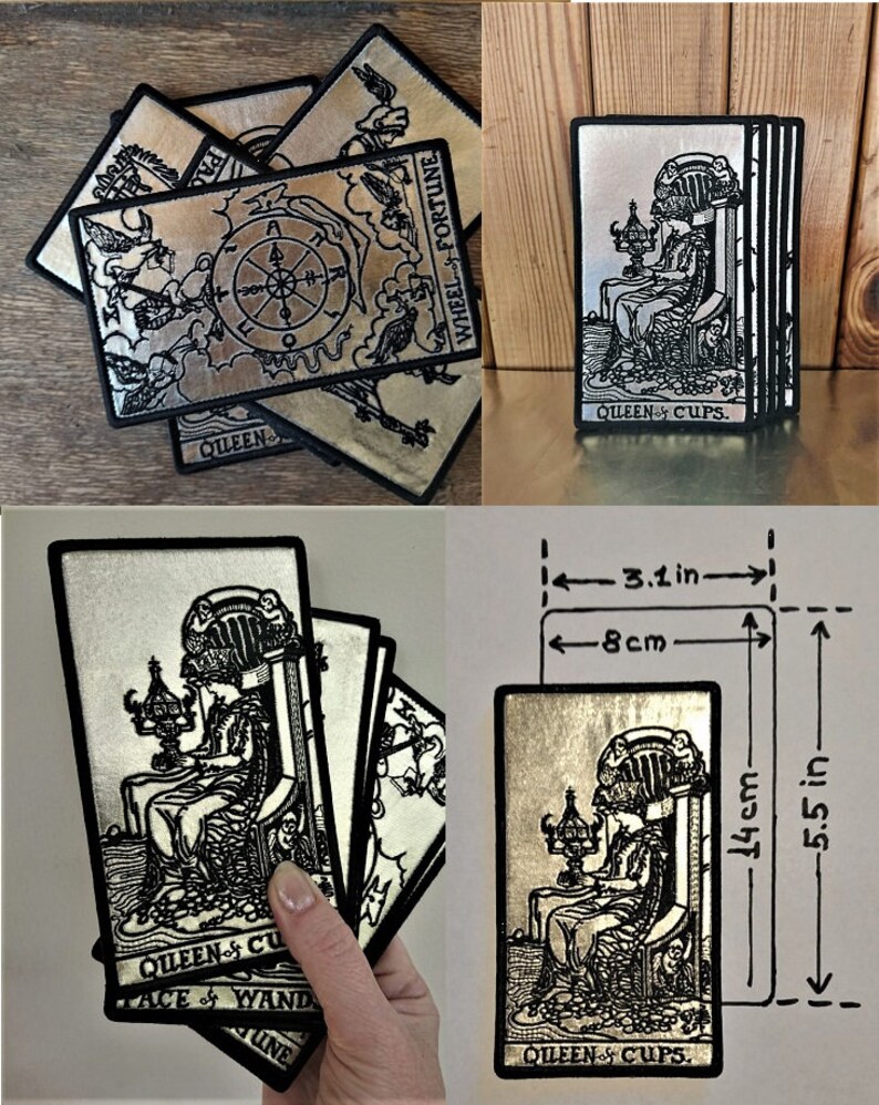 May include: Five silver tarot cards with black embroidery. The cards are Queen of Cups, Wheel of Fortune, Page of Wands, and Ace of Wands. The cards are 3.1 inches wide and 5.5 inches tall.