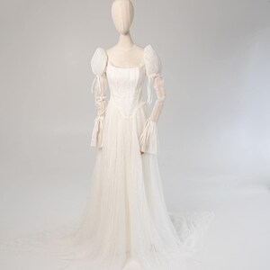 a white dress on a mannequin on a white background