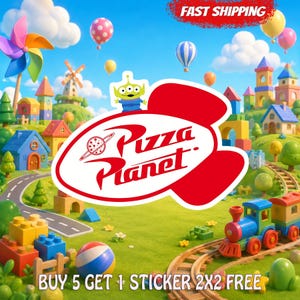 May include: A white sticker with a red Pizza Planet logo featuring a planet icon and a small green three-eyed alien character on top. The background shows a colorful toy landscape with a train, building blocks, and balloons under a blue sky.