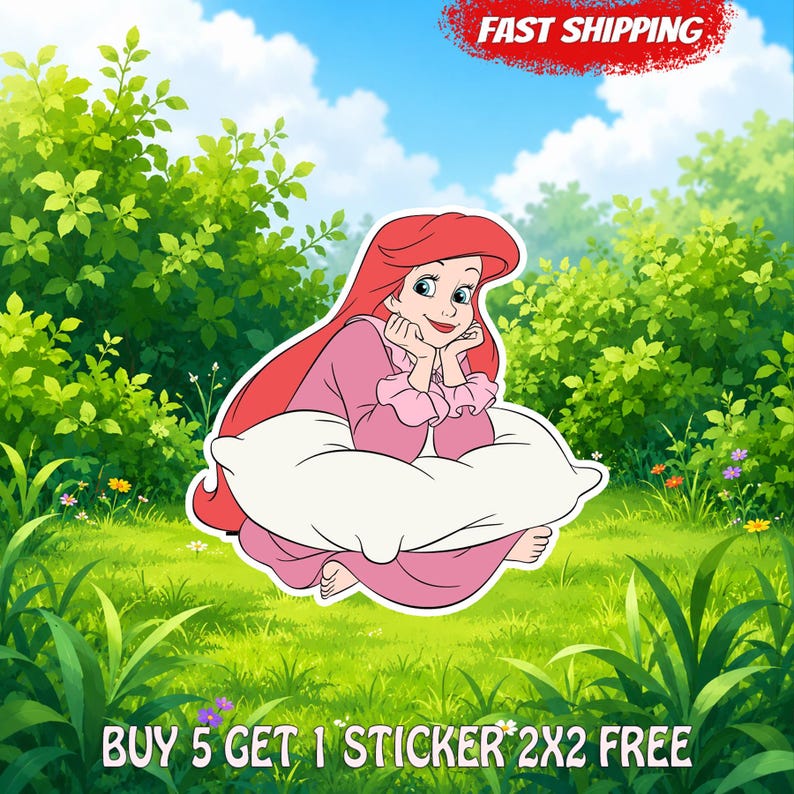 May include: A die-cut sticker featuring a cartoon character with long red hair, wearing a pink long-sleeved dress, resting their chin on their hands while sitting on a large white pillow. The character has fair skin and blue eyes.