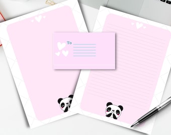 Pode incluir: Conjunto de papelaria rosa com um design de urso panda. O conjunto inclui duas folhas de papel pautado e um envelope com a palavra "Para" impressa nele. O papel tem um padrão de pontos brancos e corações brancos.