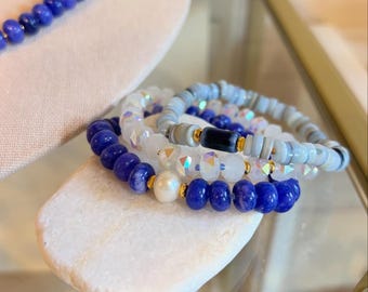 Summer necklace with color block rondelles in shades of blue. Matching beaded bracelets
