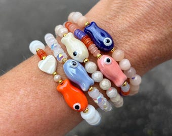 Beaded bracelets with ceramic fish beads in the prettiest summer hues