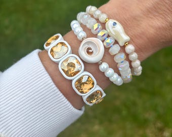 Summery beaded bracelets in white and champagne with shell and crystal elements