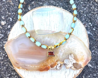Beaded 16.5” necklace with aqua and sunset golden hues