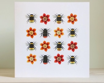 May include: A square greeting card featuring a repeating grid pattern of illustrations. The design consists of alternating bumblebees with black and yellow striped bodies and six-petaled flowers in shades of orange and red on a white background.