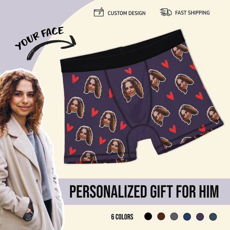 May include: Purple boxer shorts with a repeating pattern of red hearts and a woman's face. The text "YOUR FACE" is written on the image.