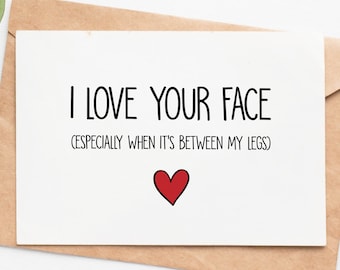 May include: A white card with black text that reads "I love your face (especially when it's between my legs)" and a red heart.