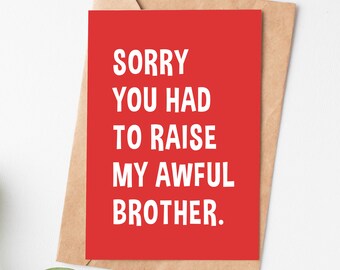 May include: Red card with white text that reads "Sorry you had to raise my awful brother."