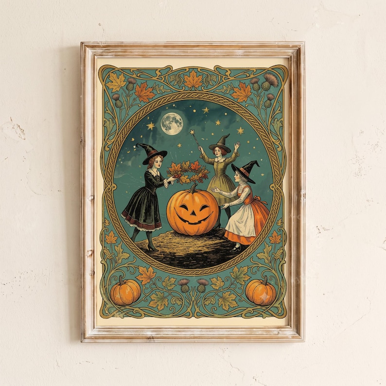 May include: A framed art print featuring three figures in pointed hats surrounding a large jack-o'-lantern under a full moon. The scene is enclosed in an ornate border of teal leaves and thistles, with two additional pumpkins at the bottom.