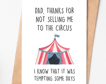 May include: A white card with a humorous message for a father. The card features a red and white striped circus tent with a blue flag on top. The text reads: "Dad, thanks for not selling me to the circus. I know that it was tempting some days."