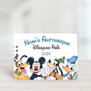Design - Mickey & Friends :
A5 autograph book with protective covers.
20 blank white pages, suitable for use with sharpie. ring binder to side and personalised with wording of your choice.