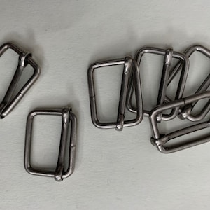 Antique Nickel Slider Buckle.  Sold In 6 Piece Sets.