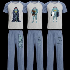 May include: Three sets of raglan-style pajamas with heather gray bodies and blue sleeves. Each shirt features a blue robot character in different poses. The pants are blue with text printed on the legs reading ZINGGG, LIGHTS OUT. ZINGS OFF., and ZING SLEEP REPEAT.