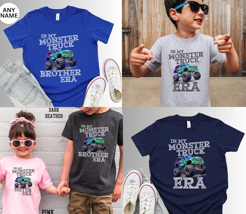 May include: A selection of children's t-shirts in shades of blue, grey, pink, and navy. Each shirt displays a monster truck graphic with the text "IN MY MONSTER TRUCK" and "ERA". Some shirts also feature "BROTHER" or "SISTER".