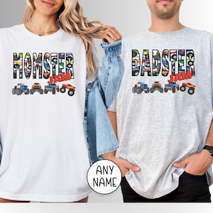 May include: Two gray t-shirts with a graphic design of monster trucks and the words "Momster Jam" and "Dadster Jam".