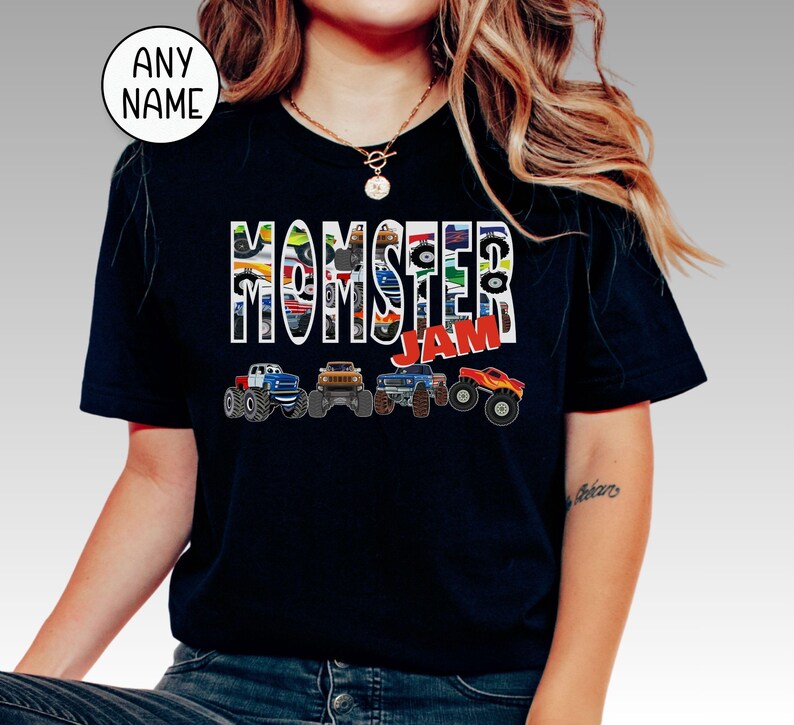 May include: A black t-shirt with a graphic of monster trucks and the text "Monster Jam".