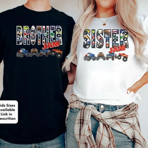 May include: Two t-shirts, one black and one white, with the words "Brother Jam" and "Sister Jam" printed on them. The words are made up of images of monster trucks.