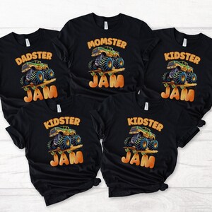 May include: Five black t-shirts with a monster truck graphic and the text "Kidster Jam", "Momster Jam", and "Dadster Jam".