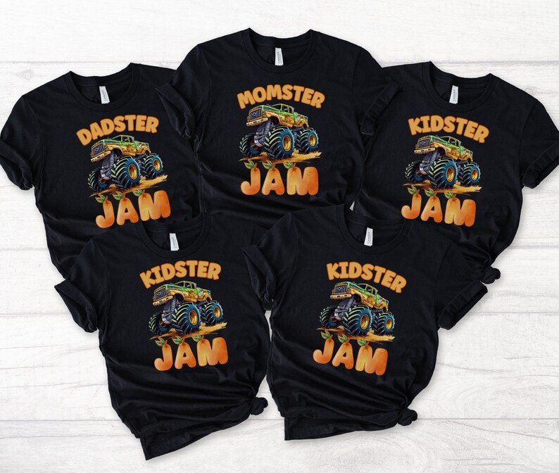 May include: Five black t-shirts with a monster truck graphic and the text "Kidster Jam", "Momster Jam", and "Dadster Jam".