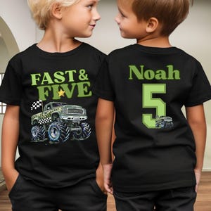 Pictured is a young boy wearing a black 2-sided t-shirt. The front says FAST & FIVE in shades of green along with a camo monster truck, a checkered flag, and a gold star. The back says custom name Noah and a big number 5 in 2 different green colors