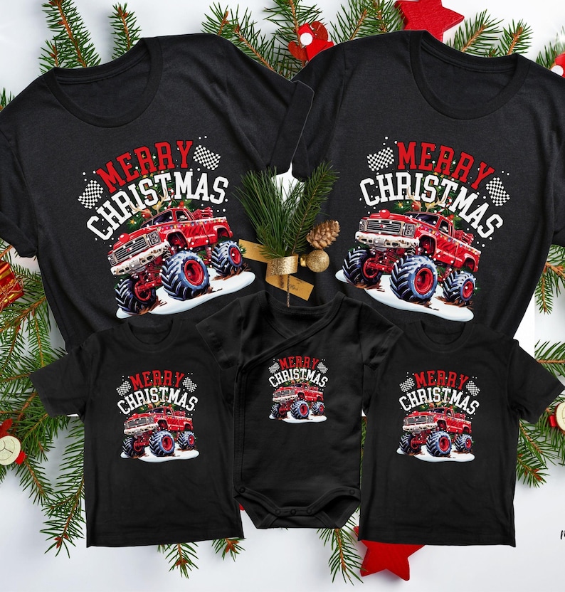Pictured are 5 T-Shirts that match in design. they are all black and all say "MERRY CHRISTMAS" in red and white bold font. There is a big red monster truck in holiday snow and 2 checkered flags