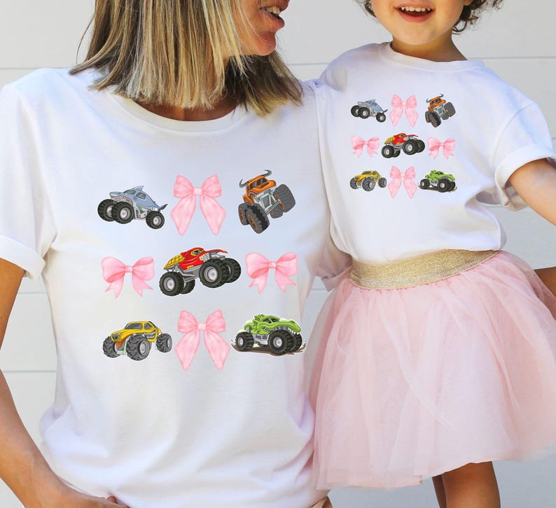 mom and toddler girl are wearing white matching t-shirts with trucks and bows. Grid design 3 x 3 with 5 various monster trucks Jam syle and 5 pink croquette bows.