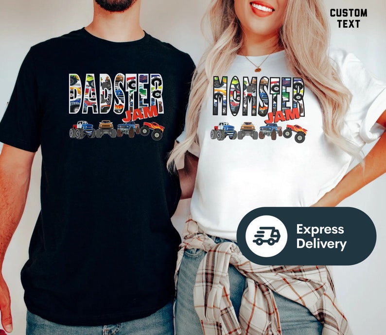 May include: Two t-shirts, one black and one white, with a monster truck theme. The black shirt says "Dadster Jam" and the white shirt says "Momster Jam". Both shirts feature a line of monster trucks with colorful designs.