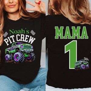 May include: Black t-shirt with a green and purple monster truck graphic and the text "Noah's PIT CREW". The back of the shirt features the word "MAMA", the number "1", and a monster truck graphic.
