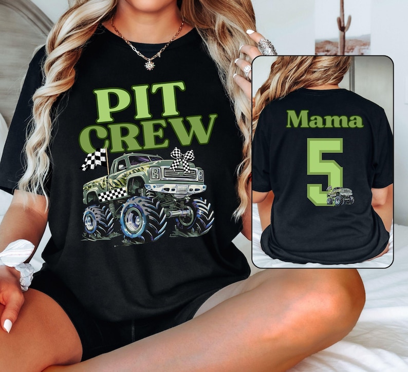 Pictured is a Mother wearing a Pit Crew Black Tee with a camo green monster truck graphic with a checkered flag. On the back is custom name Mama and a big number 5 in college varsity font