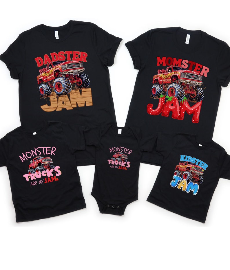 May include: Black t-shirts with monster truck graphics. Designs include "Dadster Jam," "Momster Jam," "Monster Trucks Are My Jam," and "Kidster Jam." The graphics feature red monster trucks with large wheels.