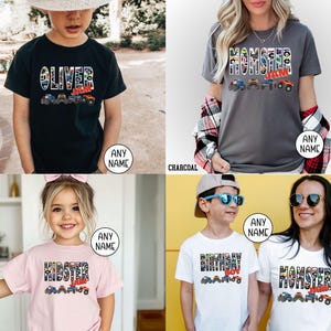 May include: Four different t-shirts featuring a Monster Jam theme. The shirts are in various colors, including black, charcoal, pink, and white. The shirts feature a colorful graphic of Monster Jam trucks and the text "Monster Jam", "Birthday Boy", "Kidster", and "Oliver".