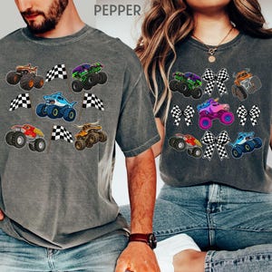 matching family monster truck shirts . comfort colors in pepper. Monster trucks and racing checkered flags. and Monster truck with checkered bows. Matching mom and dad, couple, grandparent party shirts, mother's day gift , fathers='s day gift, or gift for mom and  or dad or grandma and grandpa, aunt and uncle.