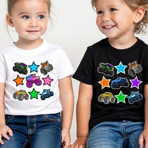 Pictured is a boy and Girl Wearing T-shirts with monster trucks and colored stars. Hers has a pink truck in the middle, his has a blue truck in the middle