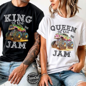 May include: Matching black and white t-shirts with monster truck graphics. One reads "KING of the JAM", the other "QUEEN of the JAM". The trucks are multi-coloured with a checkered flag.