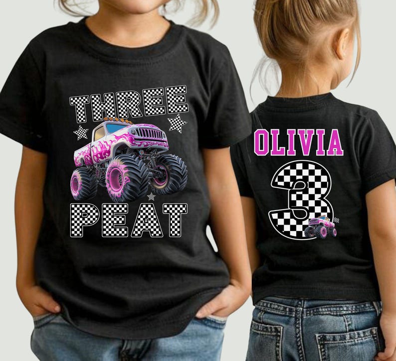 Pictured is a young girl wearing a black t-shirt which says RHREE PEAT in black and white checkered letters along with a big pink monster truck and checkered stars. On the back of the tee is custom number 3 in black and white checkered and the custom name OLIVIA