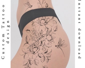 May include: Black and white line art tattoo design of a floral arrangement with two dragonflies. The design is on a person's hip and includes the text "Floral Tattoo Design".