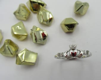 Very fine 14k white gold Claddagh ring .