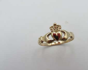 Medium 9K Rose gold Claddagh ring .