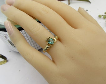 Claddagh Ring with green tourmaline.