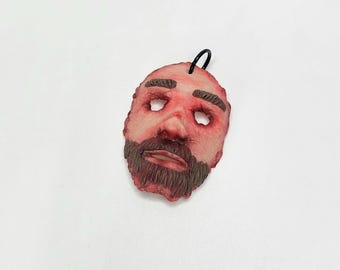 Bijoux de charme de visage d'horreur