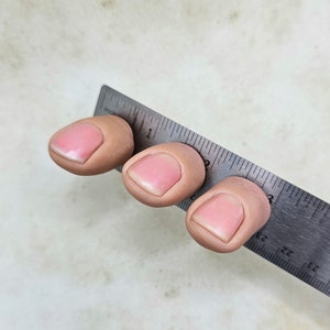 Realistic human finger magnet image 3