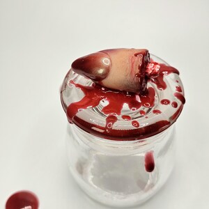 Severed finger jar