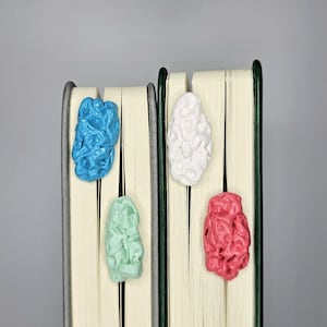 Novelty chewed gum bookmark - fun and unique page marker for book lovers