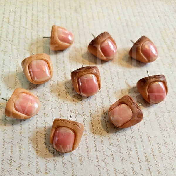 The THUMB tack Realistic thumb tacks