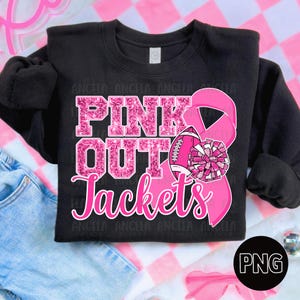May include: Black sweatshirt with the text "PINK OUT Jackets" in pink glitter lettering. A pink ribbon, football, and pom-pom graphic are also featured. The design is set against a pink and white checkered background.