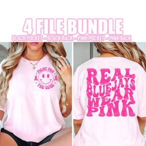 May include: Pink t-shirt with a pink smiley face and the text "Fight for the Cure" on the front and the text "Real Blue Jays Wear Pink" on the back.
