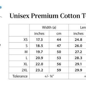 May include: White t-shirt with a diagram showing measurements in inches and centimeters. The text "GILDAN" is in blue. The text "Unisex Premium Cotton T-Shirts" is also present.