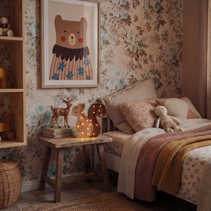 May include: A children's bedroom scene featuring a framed bear illustration, a wooden side table with a deer figurine and a squirrel-shaped night light. The bed has a floral patterned duvet and a knitted throw. A woven basket and a round jute rug complete the decor.
