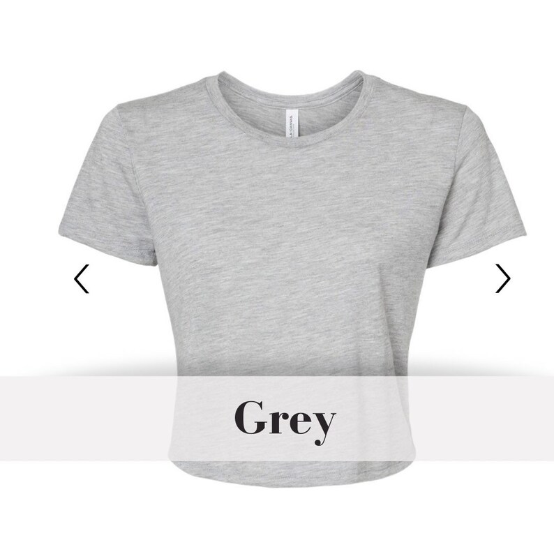 May include: A grey cropped t-shirt with short sleeves and a round neckline.
